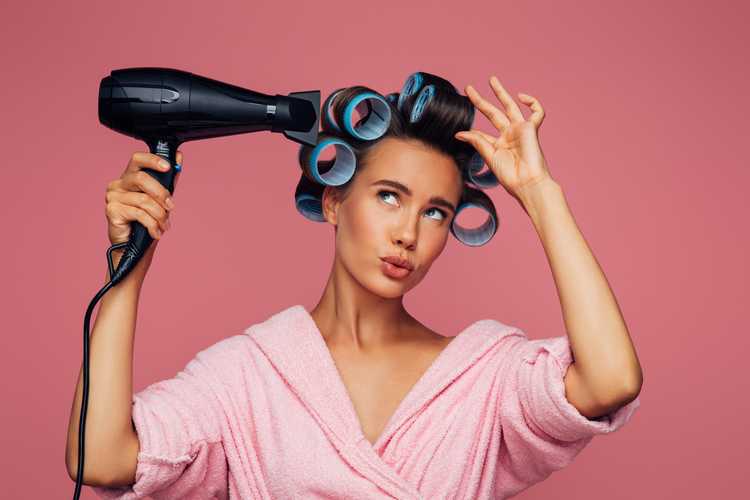 Woman Blow Drying Hair