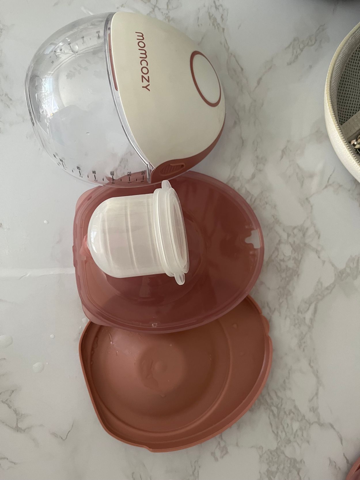 deconstructed breast pump with flange and spout