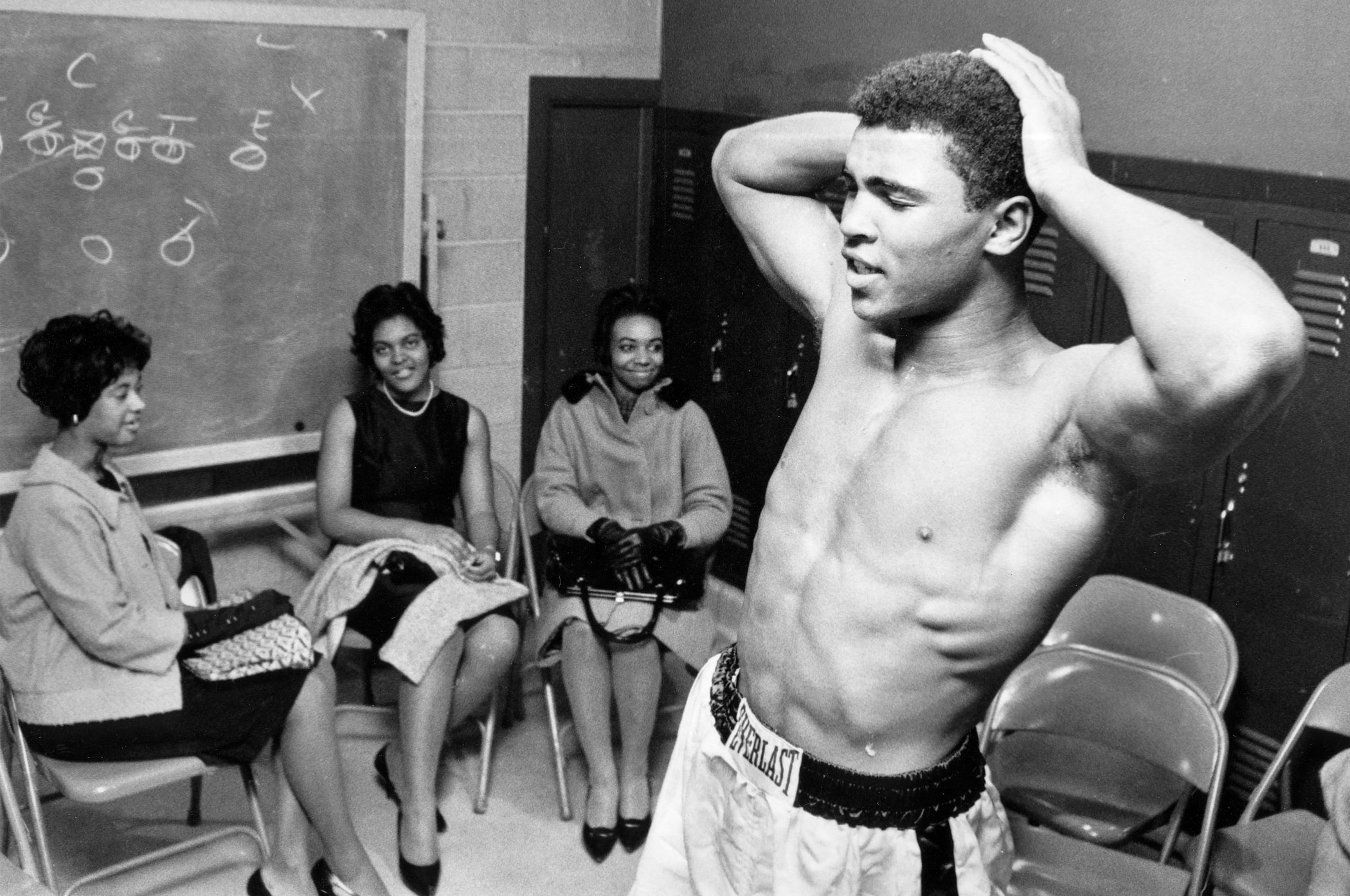 Muhammad Ali quote: I make predictions about what I'm going to do before