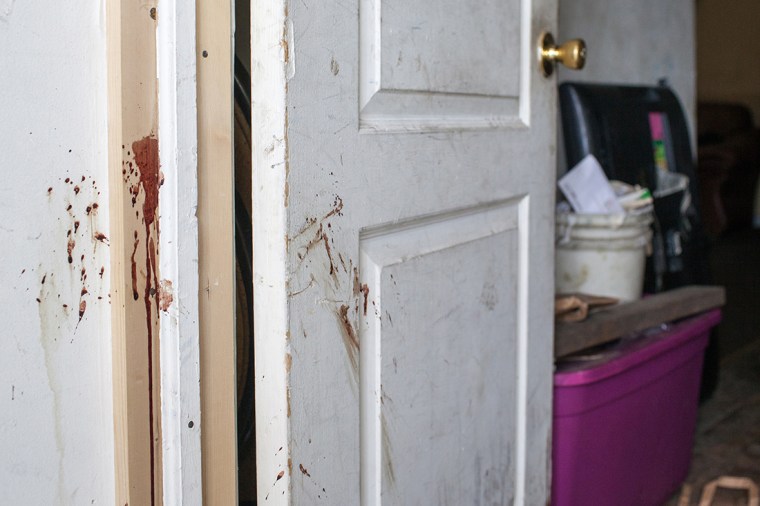 Blood remains on the door from the vestibule to inside Bettie Jones' first floor apartment from the night she was killed.