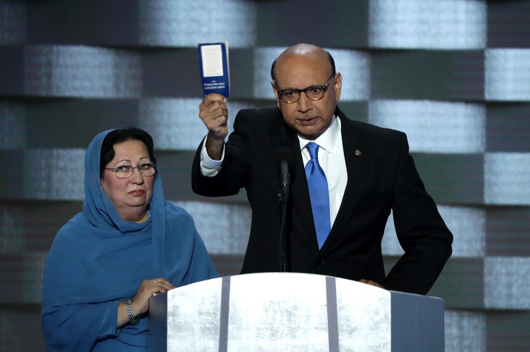 Khizr Khan, father of deceased Muslim U.S. Soldier Humayun S. M. Khan, holds up a booklet of the US Constitution as he delivers remarks on the fourth day of the Democratic National Convention at the Wells Fargo Center, July 28, 2016 in Philadelphia.