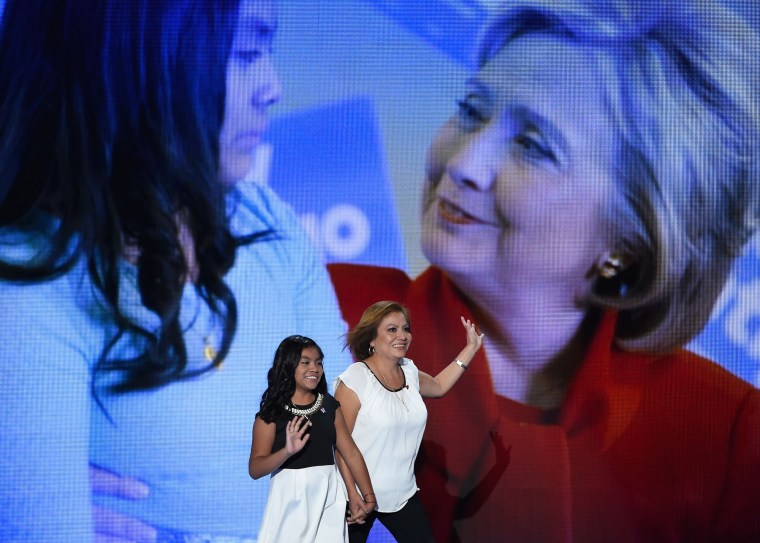 Karla Ortiz arrives on stage with her mother Francisca Ortiz during Day 1 of the Democratic National Convention at the Wells Fargo Center on July 25, 2016, in Philadelphia.