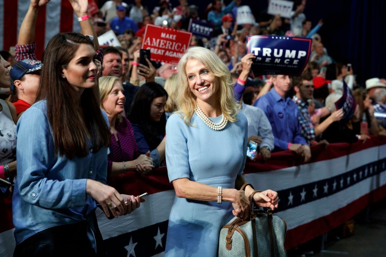 Kellyanne Conway, campaign manager for Donald Trump, and press secretary Hope Hicks watch during a campaign rally, on Oct. 14, 2016, in Charlotte, N.C.
