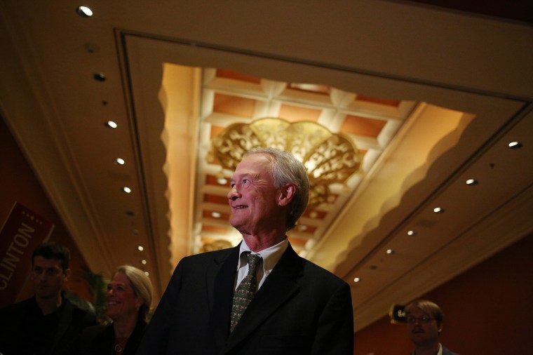 Lincoln Chafee speaks with reporters in the spin room following the first Democratic presidential debate at the Wynn Las Vegas resort and casino, on Oct. 13, 2015, in Las Vegas, NE.