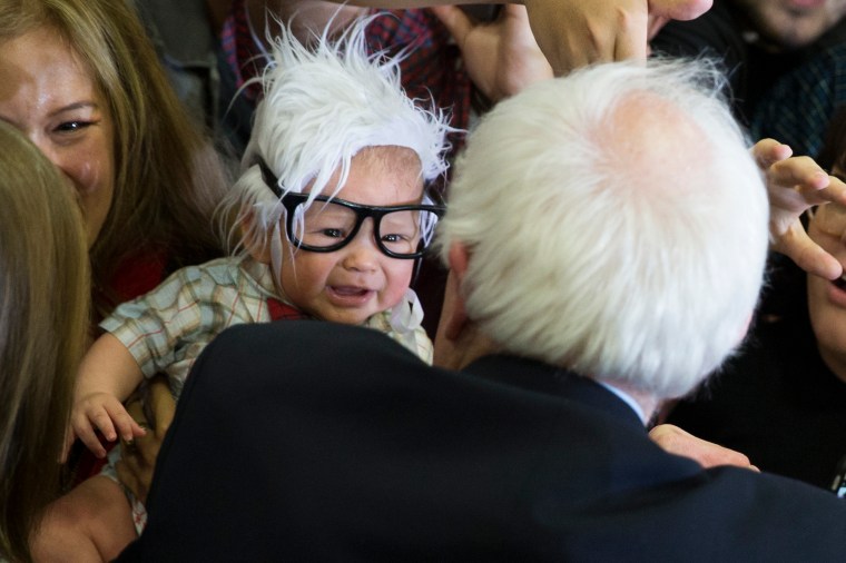 Bernie Sanders meets 3-month-old Oliver Jack Carter Lomas-Davis, of Venice, Calif., who was dressed as Sanders during a rally at Bonanza High School on Feb. 14, 2016 in Las Vegas.