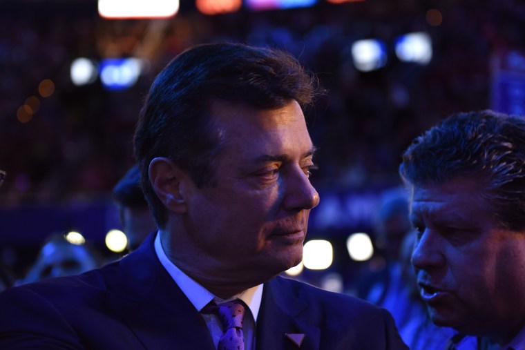 Trump campaign manager Paul Manafort walks the floor at the Republican National Convention, on July 21, 2016, in in Cleveland.