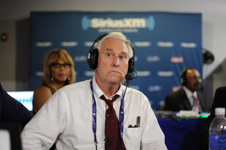 Former Donald Trump Advisor, Roger Stone, listens to host Jonathan Alter talk during an episode of Alter Family Politics on SiriusXM at Quicken Loans Arena on July 20, 2016, in Cleveland.