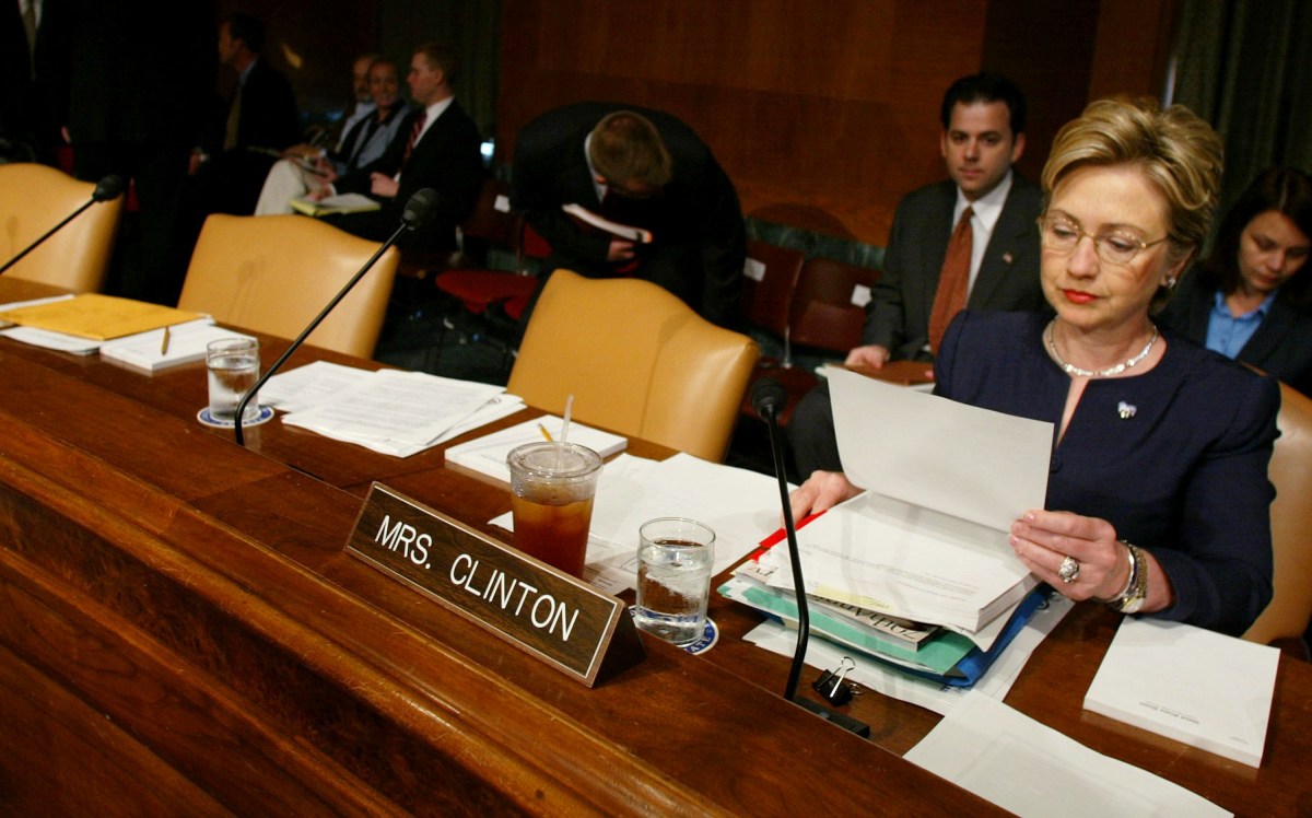 WASHINGTON - SEPTEMBER 9: U.S. Sen. Hillary Clinton (D-NY) looks over her papers before the start of a Senate Armed Services Committee hearing on Capitol Hill September 9, 2003 in Washington, DC. The committee is hearing testimony from Deputy Secretary of Defense Paul Wolfowitz and others on U.S. military commitments and ongoing military operations abroad. (Photo by Mark Wilson/Getty Images)