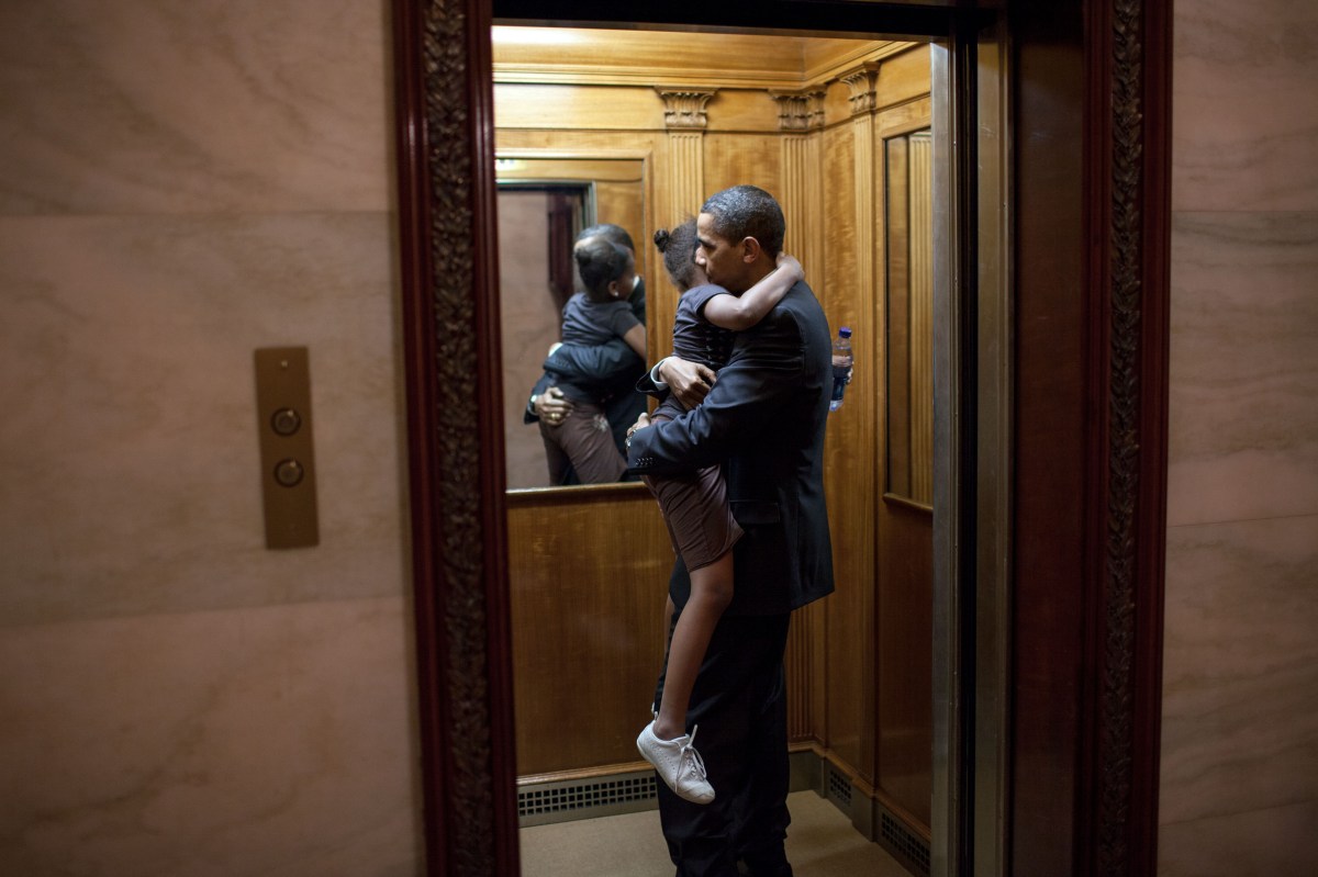 In this official White House photograph, President Barack Obama holds SashaÃƒÂ‘ after finding her in an elevator after an eventÃƒÂ‘ready to head upstairs to the private residence. He decided to ride upstairs with her before returning to the Oval Office, May 19, 2009.
