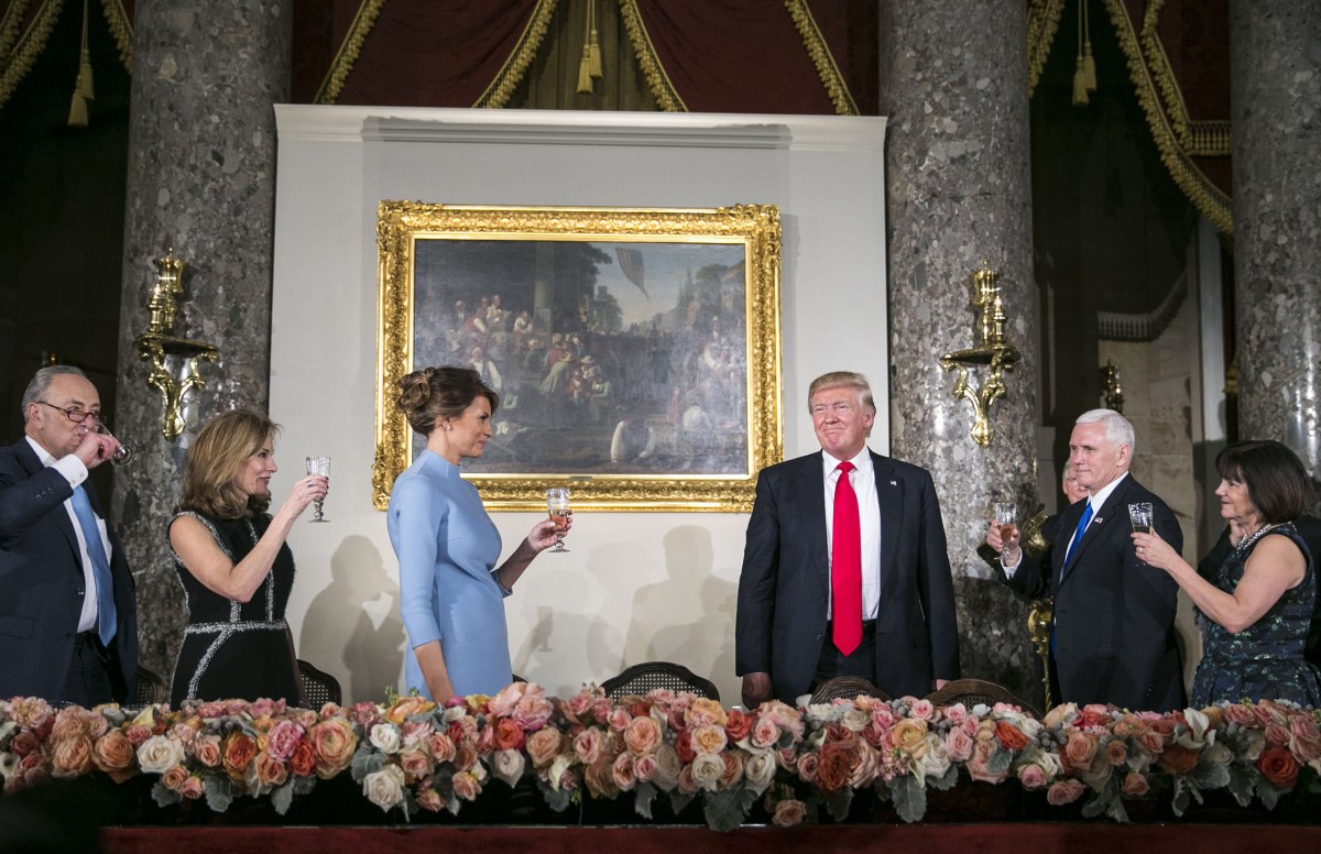 President Donald Trump is offered a toast at the Inaugural Luncheon in Statuary Hall at the U.S. Capitol in Washington on Jan. 20, 2017. From left: Senate Minority Leader Chuck Schumer (D-N.Y.), Abigail Perlman Blunt, First Lady Melania Trump, President Trump, Vice President Mike Pence and Karen Pence.