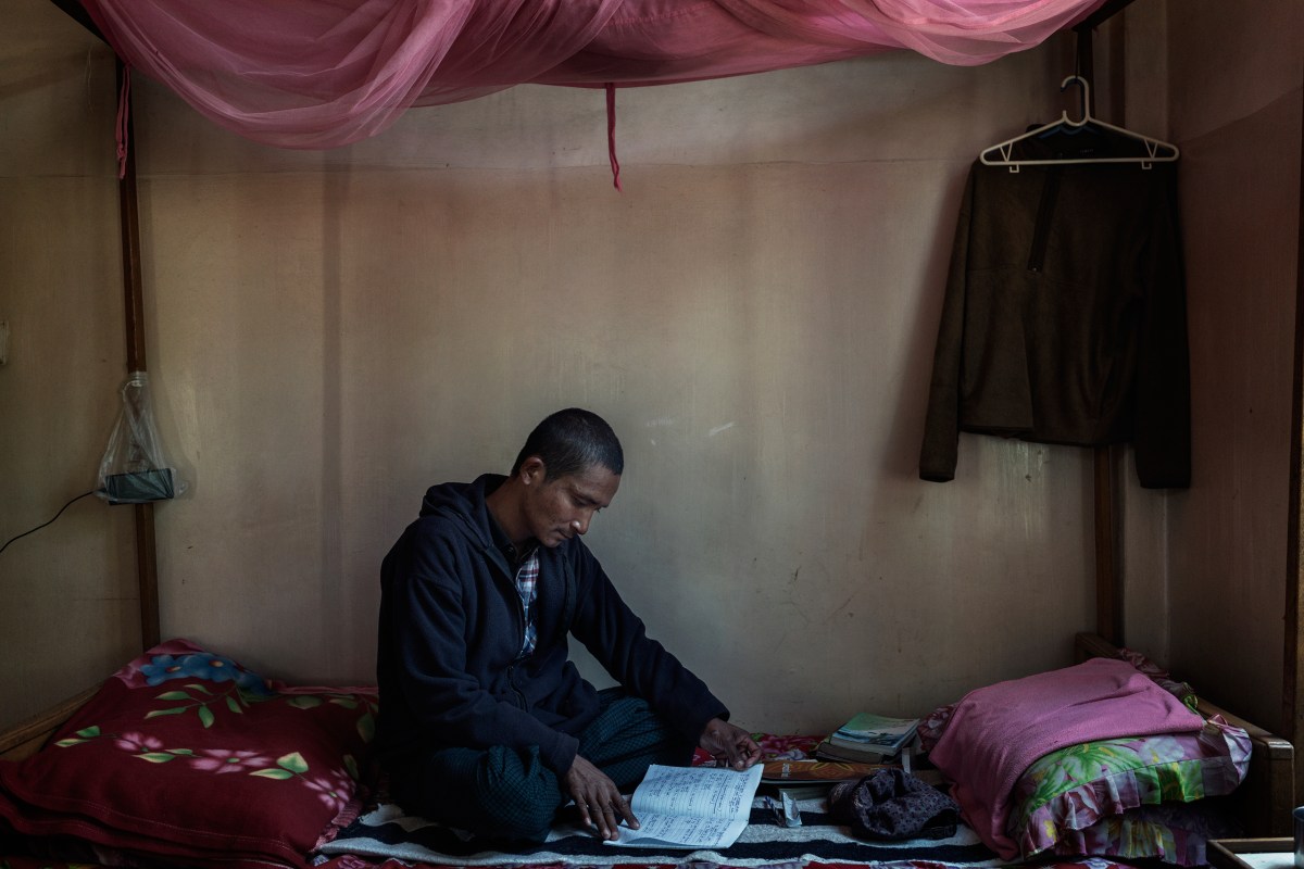 Miner Thein Than Myo, 33, a recovering heroin addict, is HIV-positive and lives at a hospice in the capital of Kachin state.