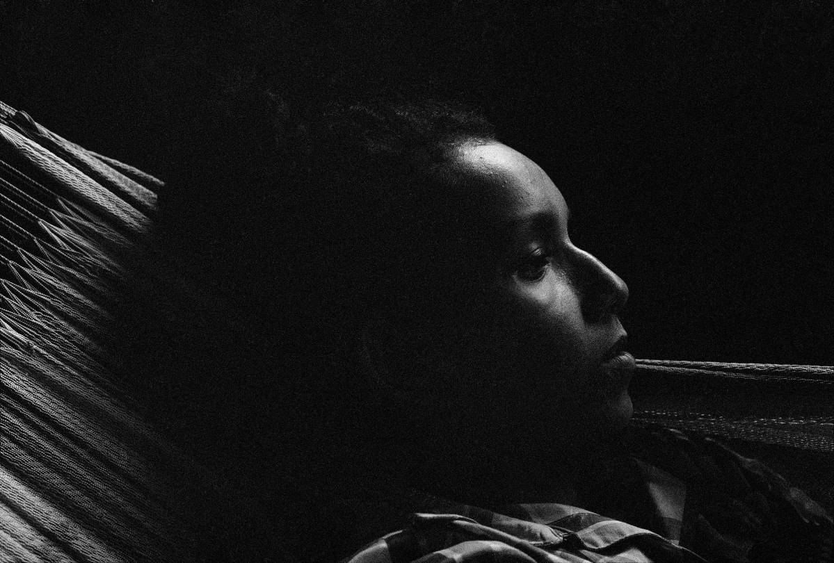 Shirley Guarín resting at her parent’s home. Orocué, Casanare State, Orinoco Region, Colombia, 2015.