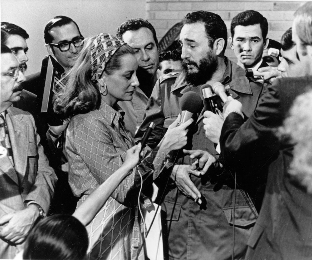 NBC reporter Barbara Walters (center) listens as Cuban Prime Minister Fidel Castro responds to her question during a news conference granted to members of the U.S. press in Havana, Cuba, on May 7, 1975.