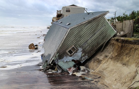 A house slides into the ocean on the Atlantic Coastâ€”one more home built too close to danger