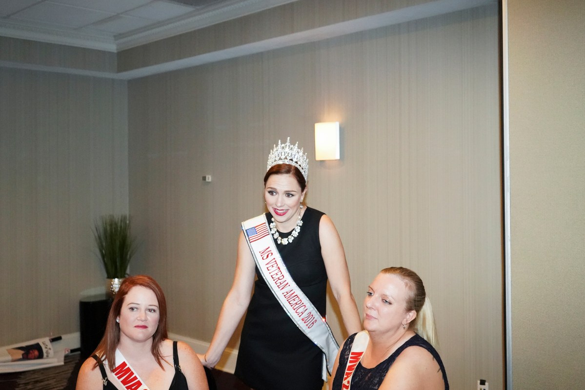 2017. Washington DC. USA. 2016 Ms Veteran America winner Molly Mae Potter with 2017 participants (L) Casey McCabe and Rebekah Lloyd (R). Ms. Veteran America is a pageant for active duty and retired female members of the armed forces. Part beauty pageant, part talent competition, part test of strength and commitment, the event raises funds for Final Salute, an organization providing housing and support for homeless women veterans and their children. Some of the participants danced and some sang, but many gave testimonials of sexual assault, PTSD and homelessness. Lindsay Gutierrez won the 2017 competition. The keynote speaker was the original "Daisy Duke", Catherine Bach.