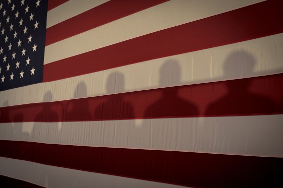 Shadows on an American Flag at Cedar Rapids Town Hall with Kamala Harris in Cedar Rapids, Iowa, Sept. 19, 2019.