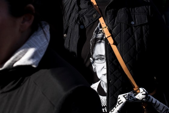 A woman attending the New York City Women's March wears a t-shirt â€‹featuring Supreme Court Justicâ€‹e Ruth Bader Ginsburg on Jan. 20, 2018.